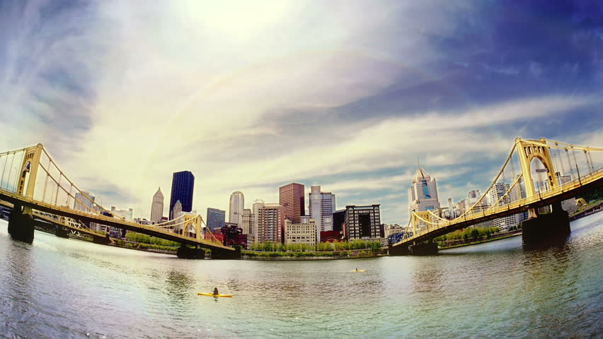 An extreme fish eye view of the Pittsburgh skyline on a sunny afternoon.