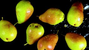 Floating fresh pears underwater with bubbles, vibrant green and yellow colors on black background. Dynamic and refreshing concept perfect for food, freshness, and healthy lifestyle themes. - Powered by Shutterstock - Get 15% off with code: PIKWIZARD15