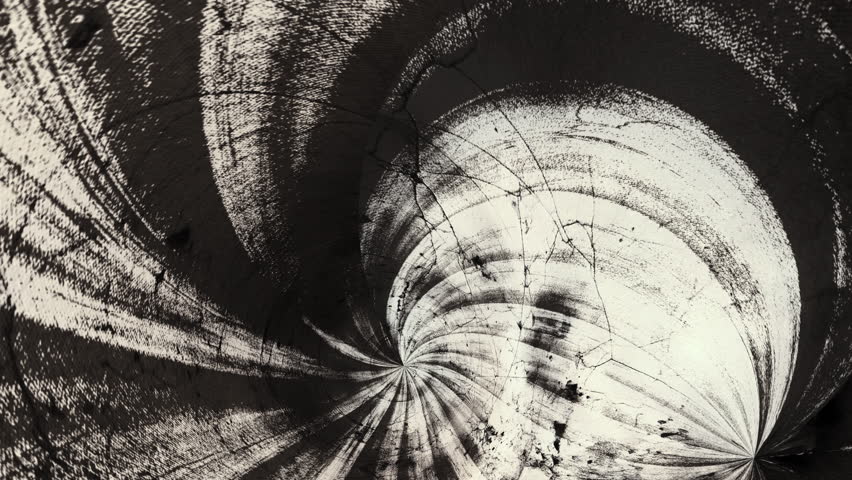 Surrealistic erratic monotone animation on grungy spiral noir background