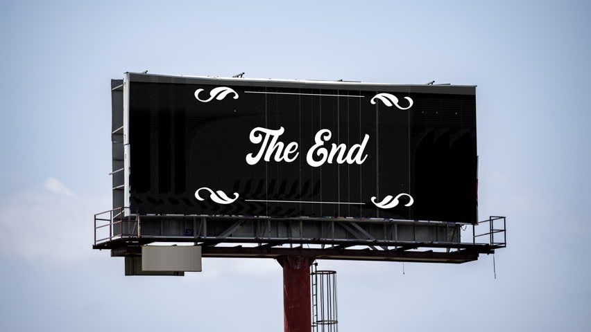large outdoor advertising board with cinematic titles the end on the screen 
