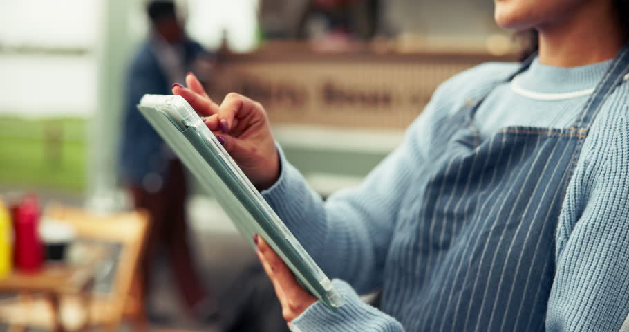 Tablet, woman and hands of waitress outdoor with inventory, online orders or stock list at food truck. Research, digital menu and female barista with technology for checking reservation at restaurant