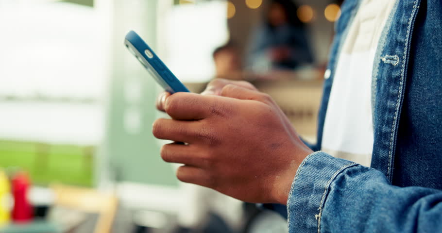 Hands, phone and search with person at food truck for customer experience, promotion post and typing. Restaurant review, vendor rating and social media with man outdoor for mobile coffee shop or van
