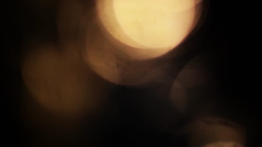 Light organic leaks effect background animation stock footage. Lens light leaks flashing around making an elegant abstract background animation. Classic Light Leak in 4k