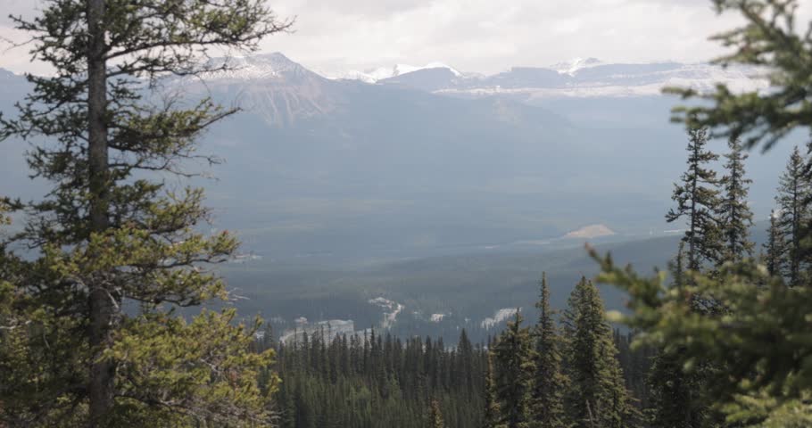 Looking down on Fairmont Lake Louise from the top of the hiking trail at Lake Agnes Tea House on Mount St. Piran and Mount Whyte, within Banff National Park near Lake Louise Alberta.