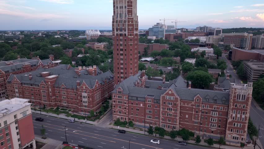 Rising Aerial Shot Of Zeppos Tower And Vanderbilt University Campus At Blue Hour In Nashville.