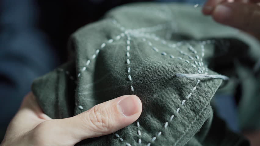Mending clothes with Sashiko, a traditional Japanese embroidery and stitching technique