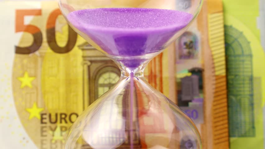 Purple sand dropping through the bulb of the hourglass and euro money on the background. Hourglass with sand stand among money. Deadline, business planning, finance and time is money concept. - Powered by Shutterstock - Get 15% off with code: PIKWIZARD15