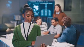 Confident businesswoman leading a diverse team of professionals in corporate boardroom, brainstorming business strategy analyzing financial data, and discussing startup growth and leadership success - Powered by Shutterstock - Get 15% off with code: PIKWIZARD15