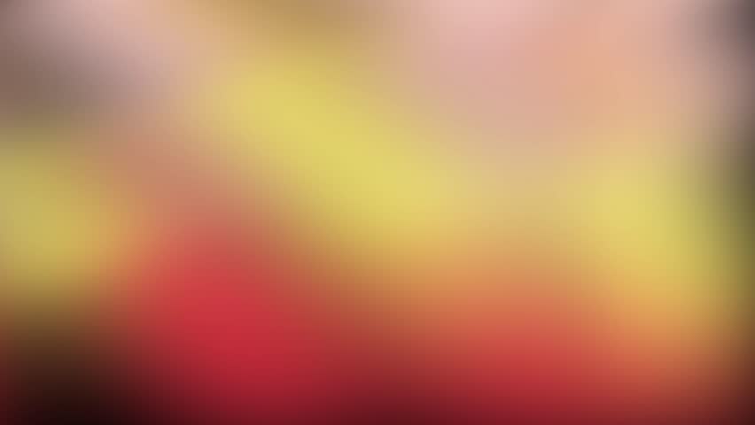 Red and yellow abstract blurred background. Soft, out-of-focus light creates a gentle, warm animation. This bokeh gradient is ideal for titles, text overlays, or a minimal, elegant backdrop.