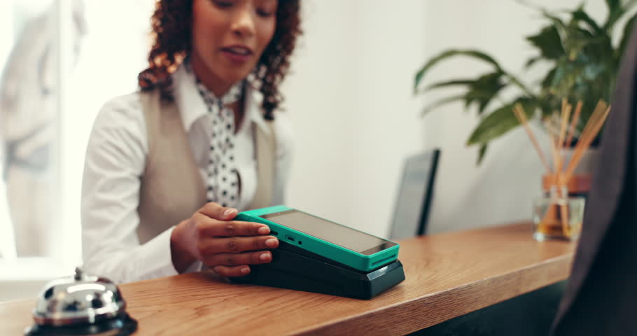 Hands, hotel or customer with credit card for reception payment, hospitality or accommodation. Client, concierge service or people at help desk with machine for guest, fintech transaction or check in
