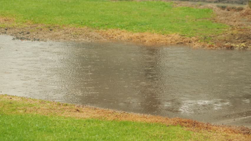 Heavy Rain Flooding Footpath, Bad Weather Overcast Daytime, Maffra, Gippsland, Victoria, Australia