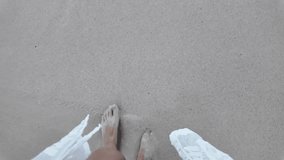 Bare Feet on Smooth Wet Sand at the Beach - Powered by Shutterstock - Get 15% off with code: PIKWIZARD15