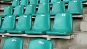 Stadium seats. Rows of green color seats in the stadium - Powered by Shutterstock - Get 15% off with code: PIKWIZARD15