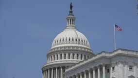 US Congress, Capitol. Washington DC the Capitol skyline with US Flag. Senate and House USA building near American Flag. District of Columbia. The Capitol building with USA flag. - Powered by Shutterstock - Get 15% off with code: PIKWIZARD15