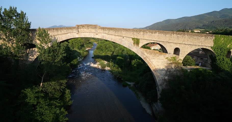Ceret, Pyrenees Orientales, Catalonia, France. The Pont du Diable overcrossing the river Le Tech.