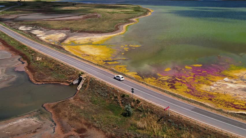 A Scenic Coastal Drive featuring Stunning Vibrant Wetlands and a Colorful Landscape awaits you
