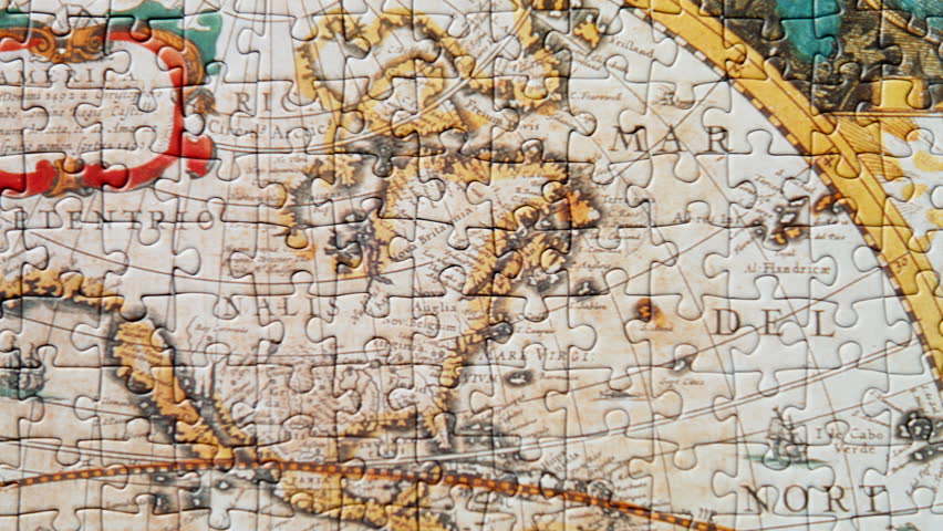 Puzzle pieces assembled on black surface showing missing fragments closeup. Jigsaw antique geographical landscape background. Vintage cartography style game. Cultural connection geographic knowledge