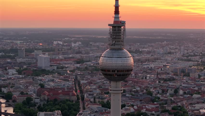 Alexanderplatz TV Tower Close Up View, Fernsehturm at Sunset Time in Berlin City Center, Aerial Parallax Drone Shot.