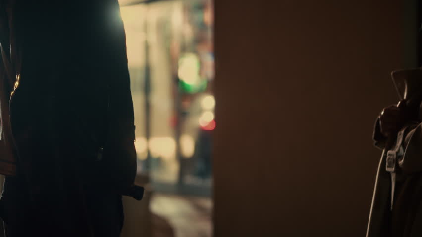 Secret deal and dirty business exchange of money in street alley at night. Two people hand off envelope in return for briefcase. Spy or government agents. Conspiracy fraud selling business secrets