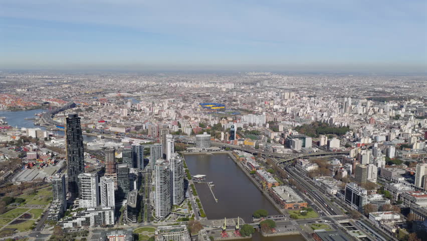 High altitude aerial view of city center of Buenos Aires with modern infrastructure and metropolitan area, Argentina.
