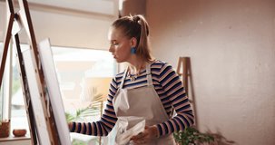 Easel, learning and painting with woman in studio apartment for artistic or creative expression. Canvas, inspiration and process with painter in home for art project, drawing activity or hobby - Powered by Shutterstock - Get 15% off with code: PIKWIZARD15