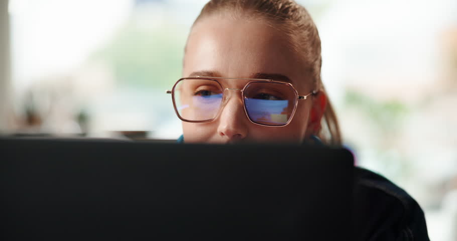 Computer, reading and business woman in office for editing, copywriting and research in startup. Technology, worker and review email on internet for creative article, blog and content writing project