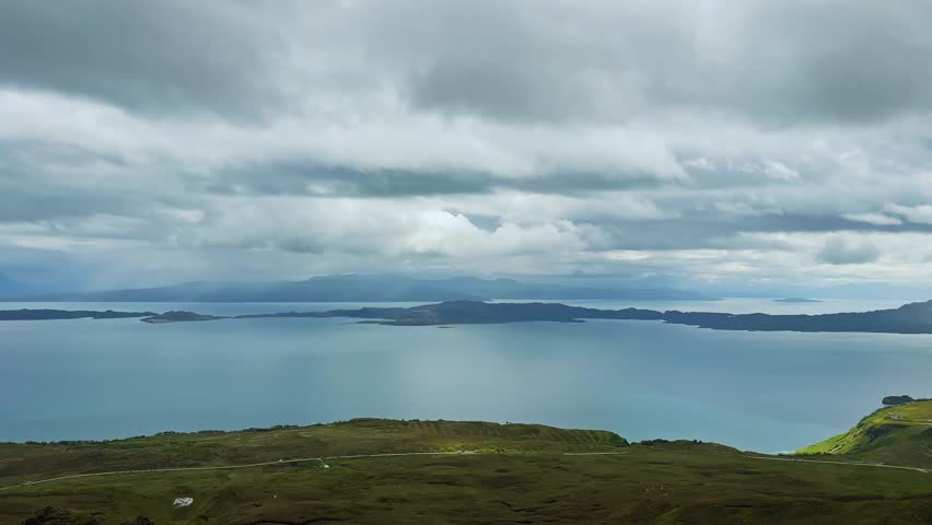 The Old Man of Storr Rock Formation On The Mountain On Trotternish Peninsula Of Isle of Skye in Scotland. - wide pan shot