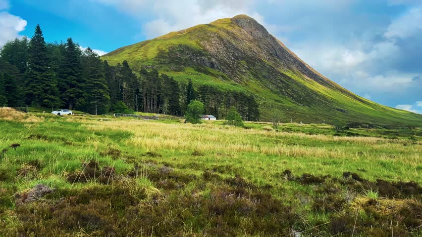 A Scenic View Of Glencoe In The Scottish Highlands. Panning Shot