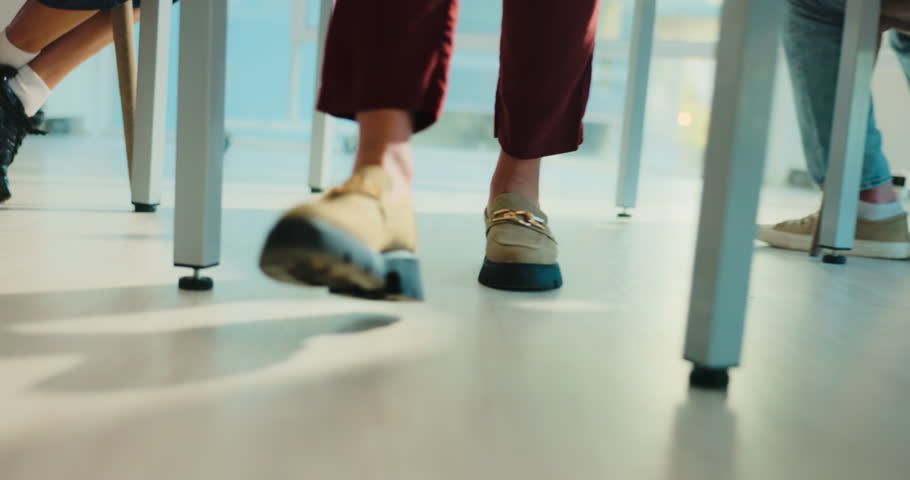 Feet, person and teacher walking in classroom to monitor students, exam supervision and protocol. Legs, lecturer and Invigilation of assessment, prevent cheating and maintain order of time management