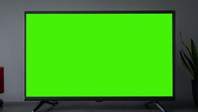 TV screen mockup background. Lcd tv monitor with blank green screen in living room while watching  - Powered by Shutterstock - Get 15% off with code: PIKWIZARD15