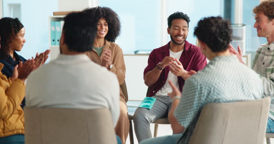 Happy, group and applause for therapy session, circle and support for mental health, help and trust. Clapping, people and celebration for breakthrough, compassion and community for counselling
