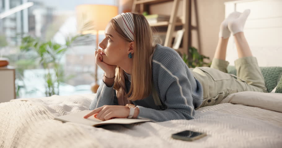 Woman, writing or thinking with book in bed for story, schedule reminder or diary in home. Female person, journalist or contemplating with notes in bedroom for design, ideas or inspiration in house
