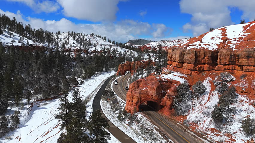 Red Canyon Tunnel Through State Route 12 Near Bryce Canyon National Park In Utah, USA. Aerial Drone Shot