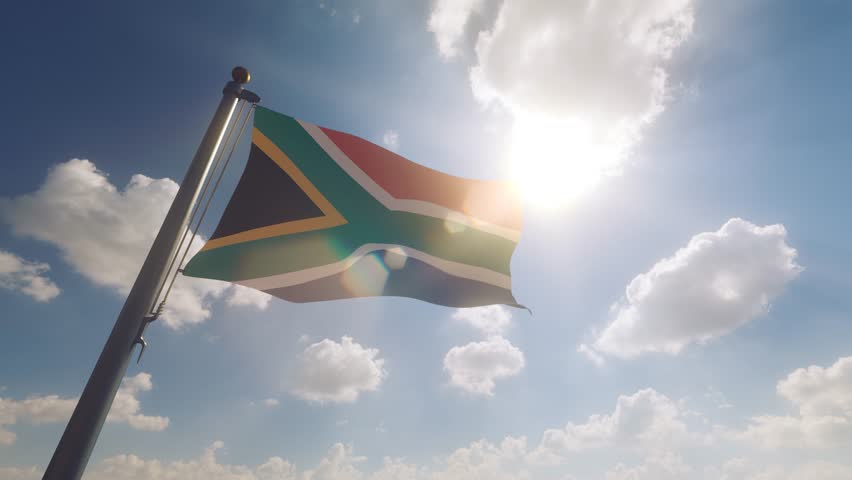 South Africa Flag on a Flagpole with a cloudy blue sky background
