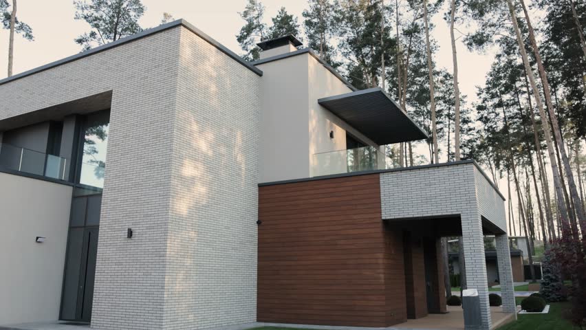 The modern architectural design boasts beauty within a tranquil and serene forest setting