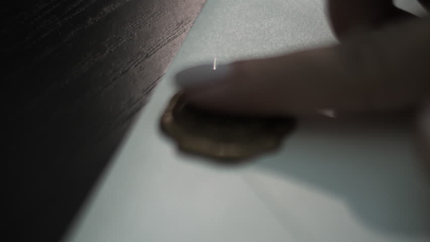 Bride sealing wedding letter with wax stamp