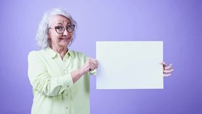 Senior woman displaying blank sign with changing expressions - Powered by Shutterstock - Get 15% off with code: PIKWIZARD15