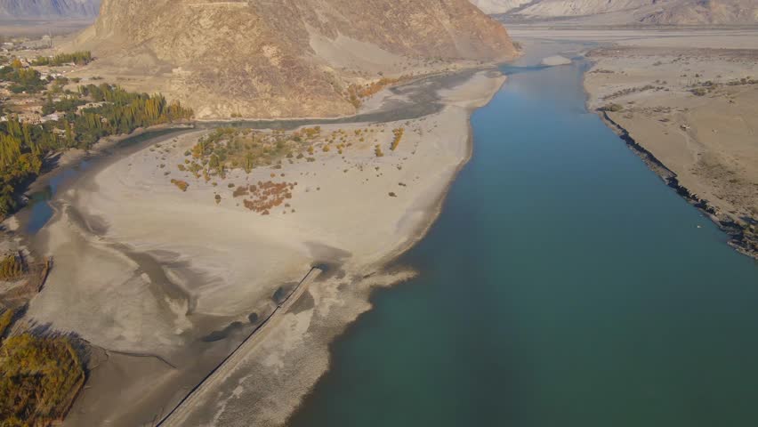 Aerial view of Indus River winding through mountains, Pakistan.