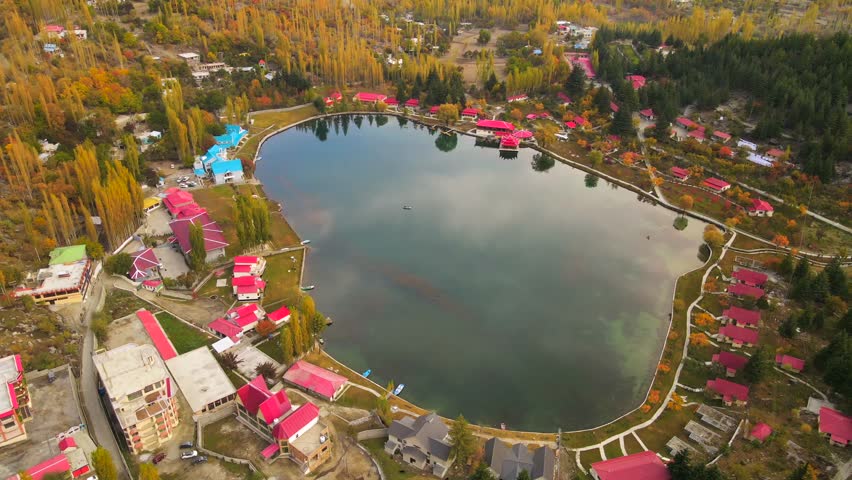 Aerial view of Lower Kachura Lake and autumn trees, Pakistan.