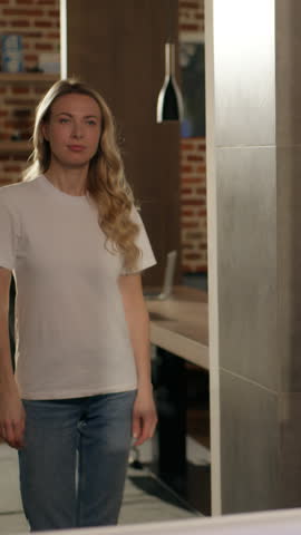 Funny dancing Caucasian woman girl having fun walking bathroom spinning music dance song singing rhythm active wellbeing happy female model homeowner moving playful beautiful lady party at home bath