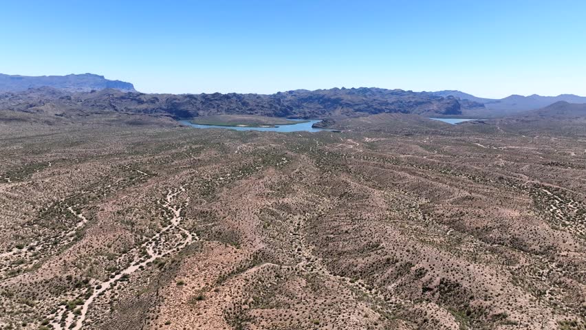 Aerial view of mountains and lake in desert, United States.