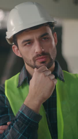 Thoughtful Caucasian guy foreman builder thinking in construction contractor contemplation puzzled technician man deciding male electrician think solution building project problem architect brainstorm