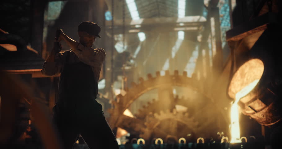 Industrial-Age Male Laborer Grips a Sledgehammer with Both Hands, Delivering Powerful Blows Onto Metal. Surrounded by Coal Smoke and Glowing Molten Iron, Laborer Works with Grit and Determination