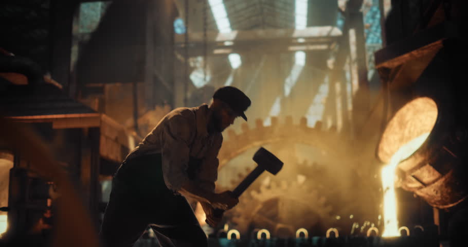 Industrial-Age Male Laborer Grips a Sledgehammer with Both Hands, Delivering Powerful Blows Onto Metal. Surrounded by Coal Smoke and Glowing Molten Iron, Laborer Works with Grit and Determination