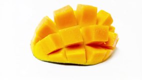 Footage of Mango slice cut to cubes isolated on the white background. - Powered by Shutterstock - Get 15% off with code: PIKWIZARD15