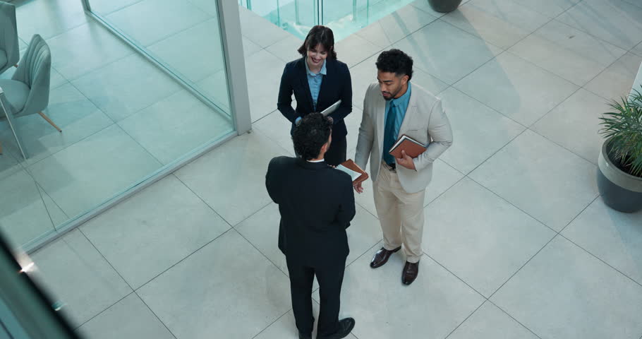 Above, handshake and welcome with business people in office for meeting, B2B and teamwork. Partnership, introduction and shaking hands with employees in agency for agreement, deal and thank you