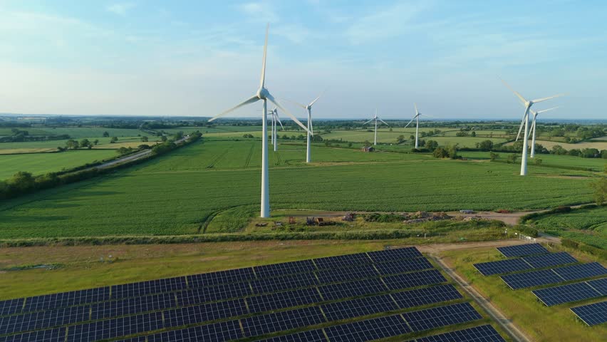 Overhead Perspective of Renewable Energy Array: Solar Modules and Wind Turbines in English Hills