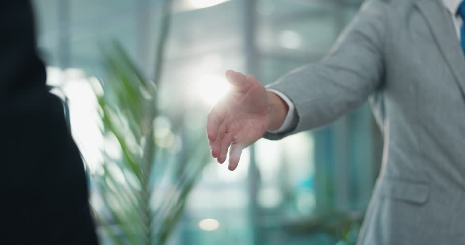 Teamwork, handshake and meeting with business people in office for contract, B2B and welcome. Partnership, introduction and shaking hands with employees in agency for agreement, deal and thank you