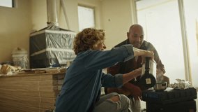 A mature woman pours hot coffee for a mature man inside a home under renovation. They are taking a break and having a coffee and a snack during the renovation. - Powered by Shutterstock - Get 15% off with code: PIKWIZARD15
