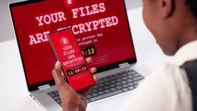 Cyber Attack. Ransomware Virus Infects Laptop Computer And Phone - Powered by Shutterstock - Get 15% off with code: PIKWIZARD15